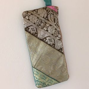Turquoise and golden floral paisley clutch